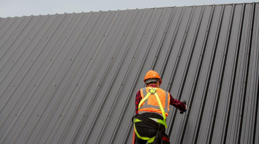 Professional metal roof installation services in Woodville, WI